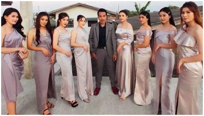 Man shares single house with 8 women, lives happily