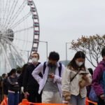 Record COVID infections in Hong Kong burden hospitals, China promises support