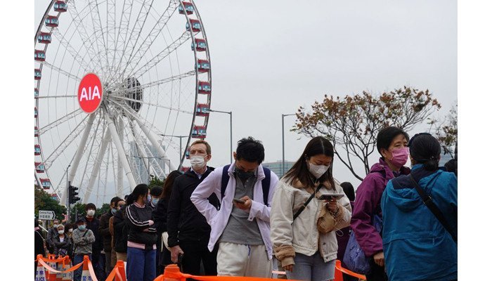 Record COVID infections in Hong Kong burden hospitals, China promises support