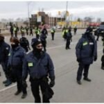 Canadian police arrest protesters, mayor says border bridge crisis over